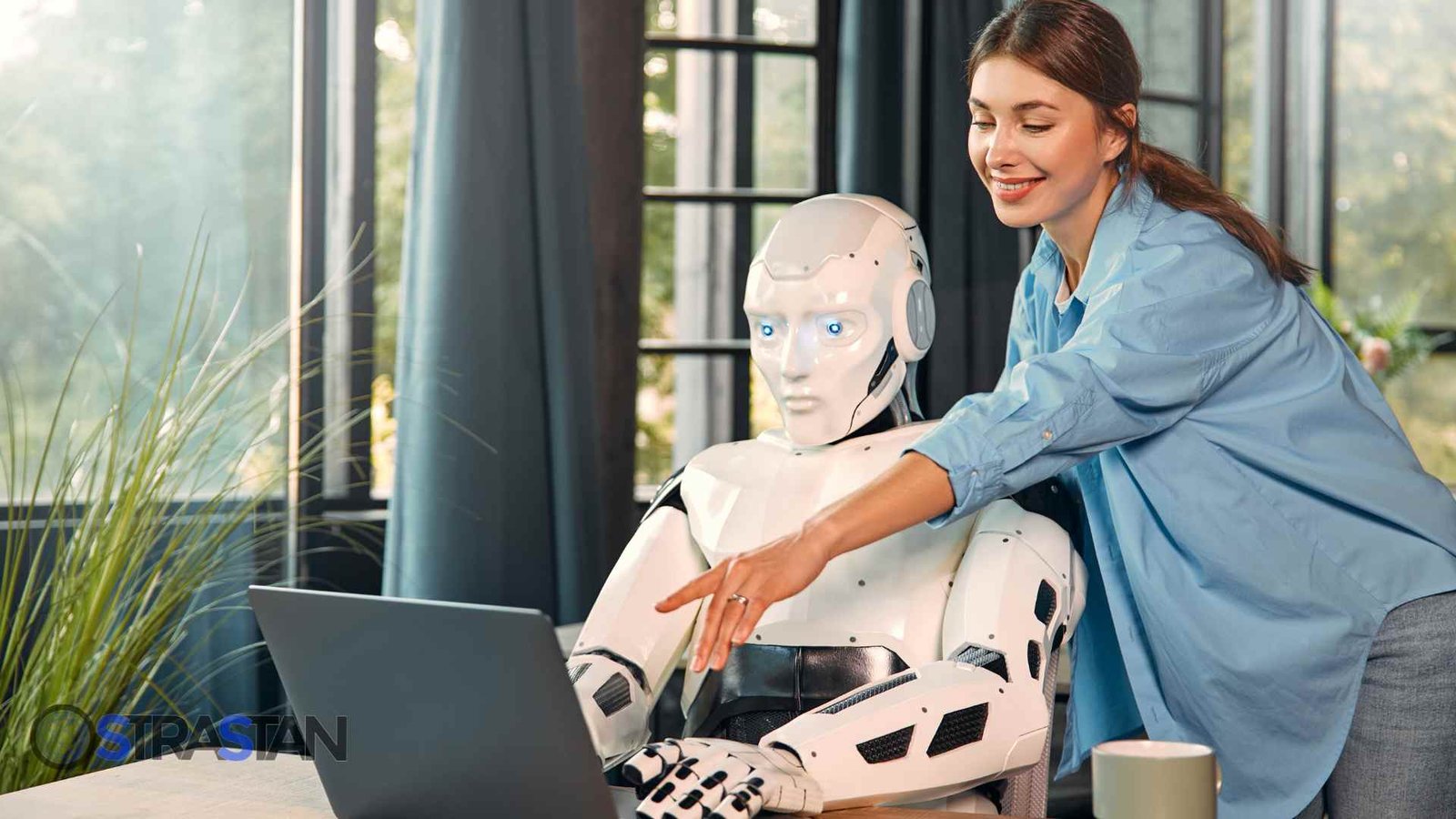 A woman collaborating with a humanoid robot on a laptop, representing Agentic AI automation in action for smarter business solutions.
