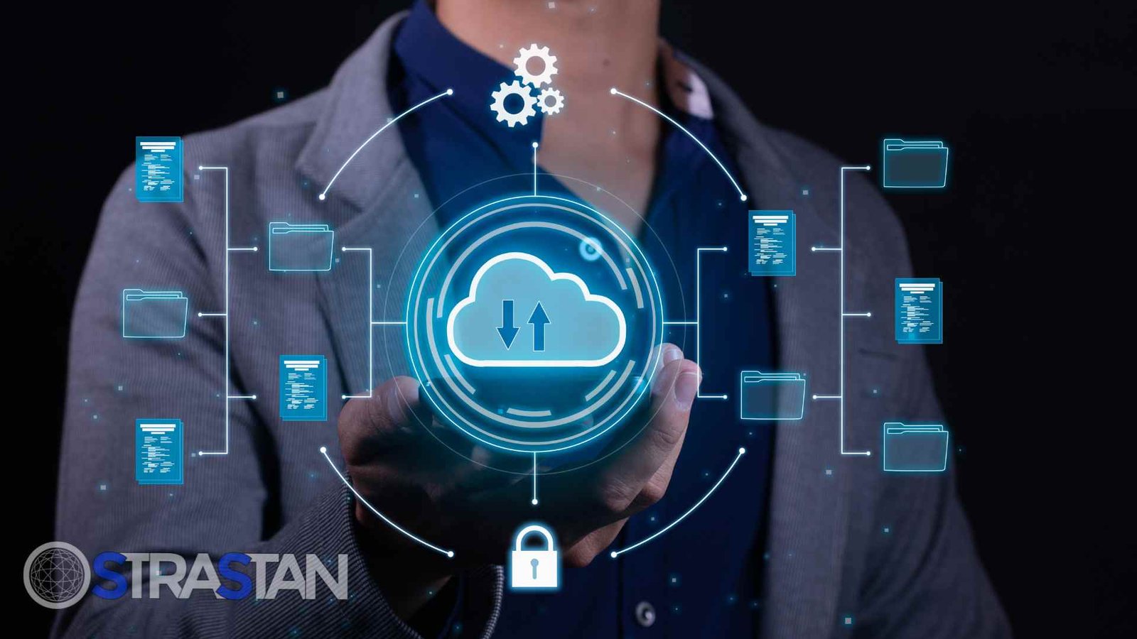 A businessman holds a glowing blue cloud icon, illustrating secure data management through the AWS Startup Program.

