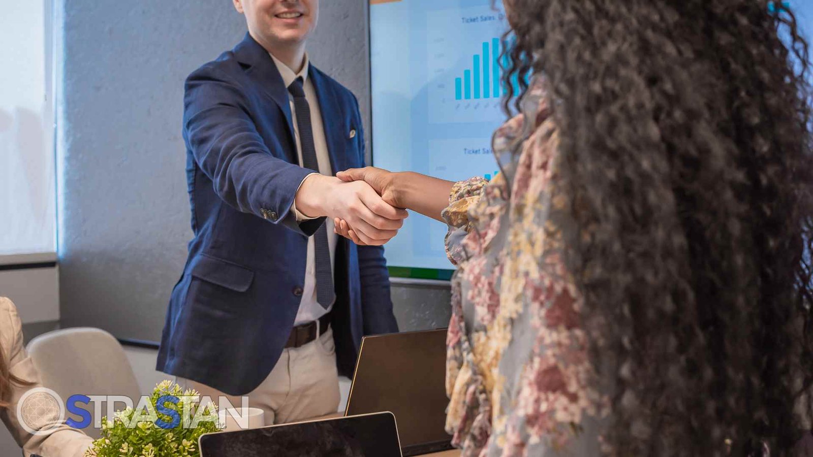 wo diverse business professionals shaking hands, sealing the trust and commitment that defines a future proofing partnership.